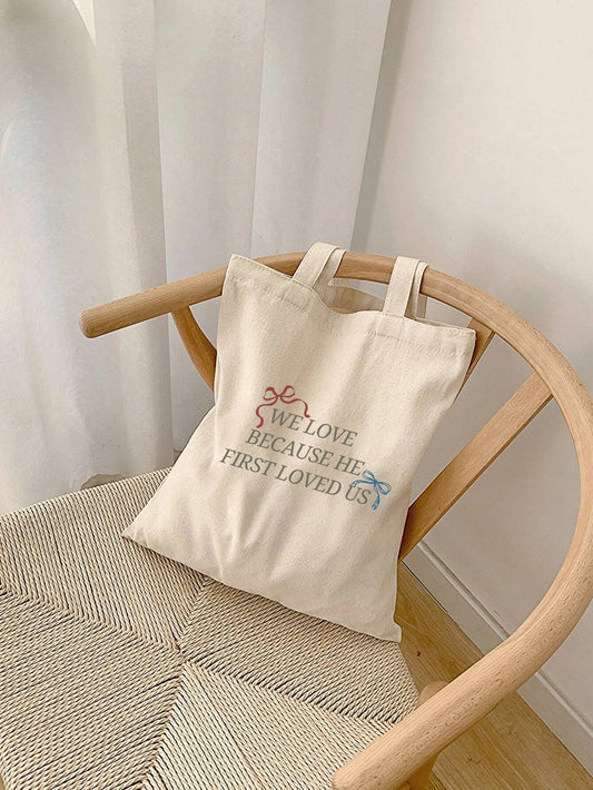 HE FIRST LOVED US Tote Bag